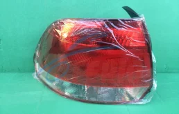 Фонарь левый для Volkswagen Polo 2013 года на фотографиях