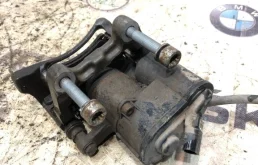 Суппорт задний левый для Volkswagen Passat 2015 года на фотографиях