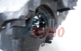 Фара левая для Nissan X-Trail 2005 года на фотографиях